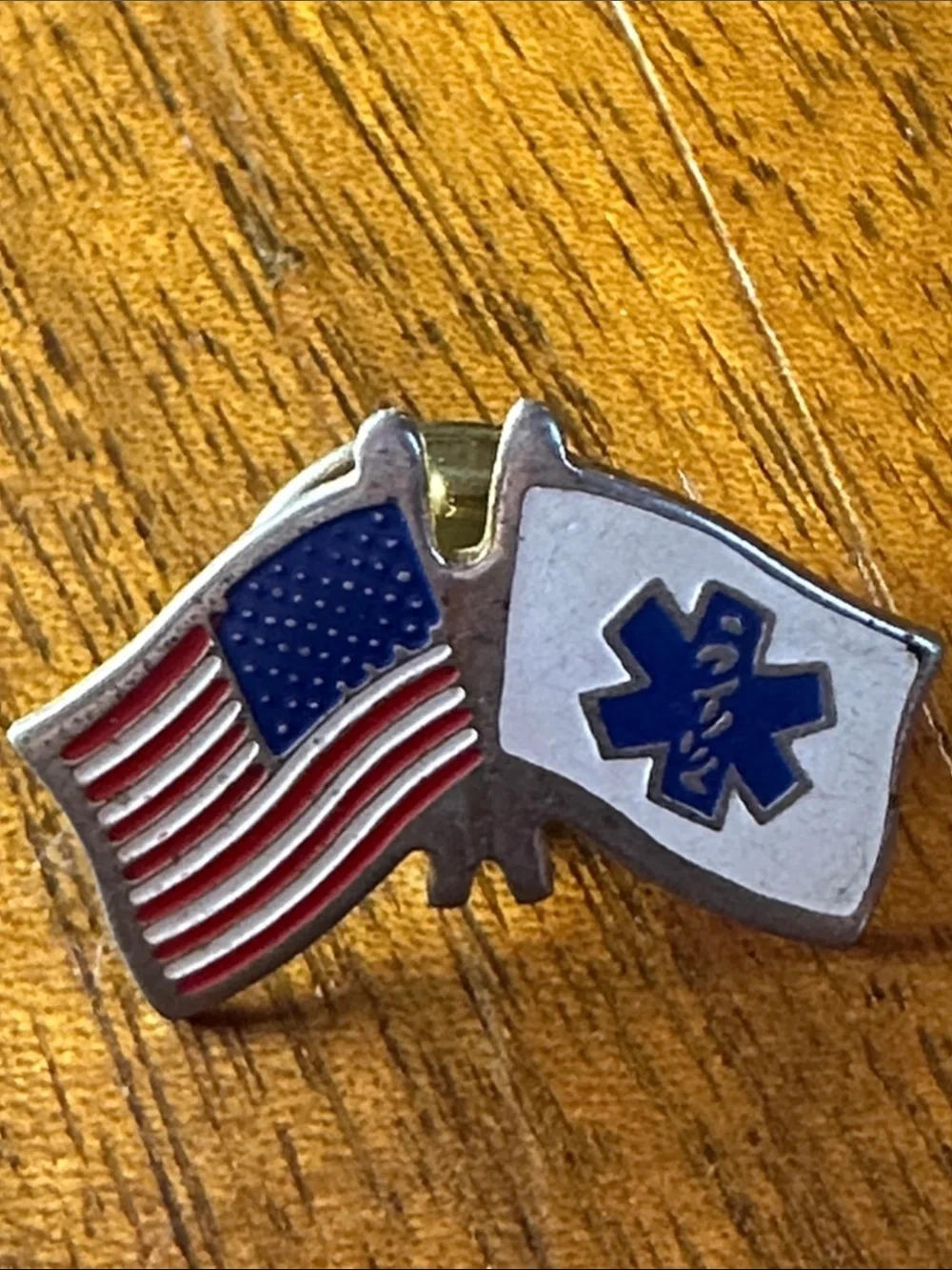 Gold-Toned EMS/EMT Lapel Pin featuring crossed American and Star of Life flags